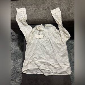 White striped blouse with ruffled sleeves. Size large.  #stripedtop